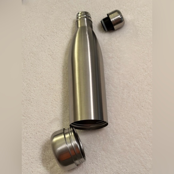 Stash spot located in a stainless steels steel water bottle. - Picture 2 of 5